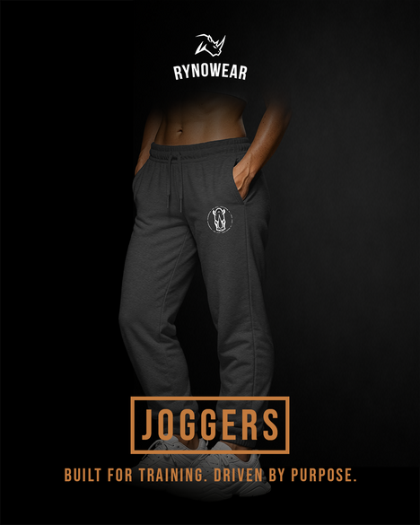 Lower body picture of a woman in gray Rynowear branded joggers, Joogers text and on a black background
